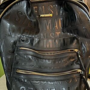 Steve Madden Embossed Black Backpack with Gold Accents